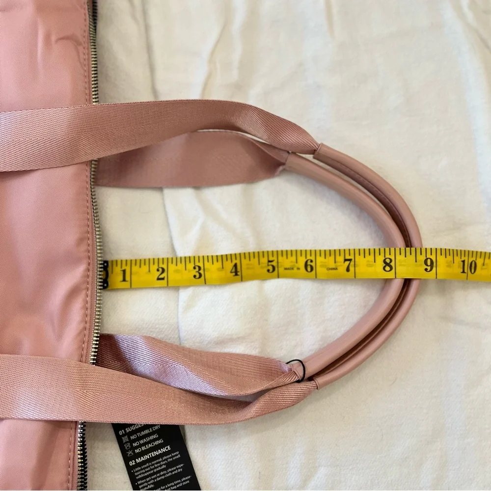 Pink soft padded nylon overnight laptop tote w/ double handle & adjustable strap